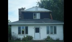 This is the before  picture for the 1200 square foot 2nd story addition  pictured 2 photo,s up .Big improvement and it is a much better choice then selling your property to move to a bigger place.