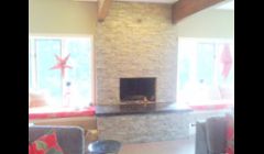 Stone veneer fireplace/hearth