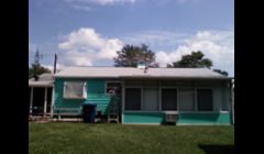 Exterior paint after... nice bright tropical look