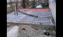 Room addition with heated stamped floor