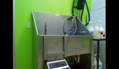 Our Bathing Area - We use a permanently stationed, stainless steel tub to get your pets squeaky clean! The stainless steel allows us the keep a consistent warm temperature to the water, as well as making sanitation of the tub easily done between each pet. 