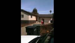 The happy customers. We also painted the roof to match the accent color. The roof was green prior. 
