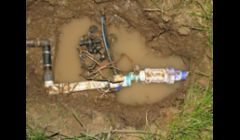 A broken irrigation pipe