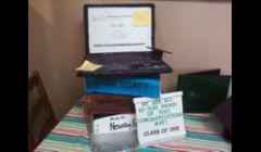 Book/Laptop Cake... 3 books, each a different flavor of cake. The laptop took a total of 20 hours to complete. The total cake took over 45 hours, weighed about 45lbs.