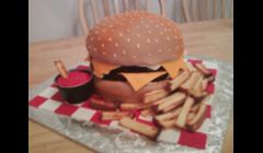 Double Cheeseburger Cake... fries are toasted pound cake & ketchup is red buttercream. =) Love this cake... looks SO real!! 