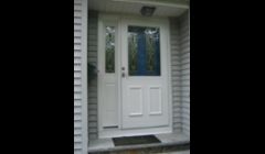 Fiberglass entry door (w sidelight) and storm door.