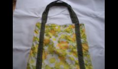This bag was made from a pillowcase and the handle was from a shirt.