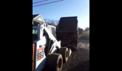 Cape Cod Bobcat & Landscape Construction Services:  Bobcat Raking, grading, back filling, clearing, brush mowing, construction.