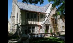 Central Contracting Inc installed slate roof and copper gutters, down spouts, and leader heads to this gorgeous Clayton home in the county of St. Louis, MO. It includes brass and bronze snow guards for and elegant and practical touch.