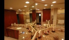 Here's the main bath.  We used mirrors and a 45 degree corner to give this room endless depth.  Careful materials selection make this a true showpiece. 