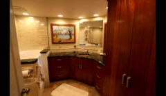 This bath features Pratt & Larsen tile and a built in Whirlpool Safety Tub.  