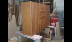 A bar stand made with zebra wood veneer and leather