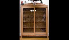 China cabinet reusing windows removed during a home remodel as doors.