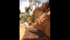 Landslide repair in Mission Hills on Bandini St. using Geo Grid soil reinforcement fabric.