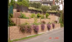 Landslide repair by installing terraced masonry and Keystone walls in Mission HIlls.