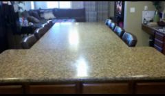 Normal kitchen island turned into a dinning room table that seats 8. (great for big family get together)