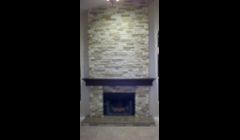 Now its a more modern fireplace with cultured stone.