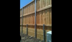 8ft board on board fence with retaining wall