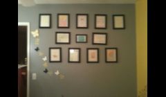 In the nursery I created a gallery wall. These are cards given to the mother at her baby shower. We framed and hung them. This wall also has stenciled design.
