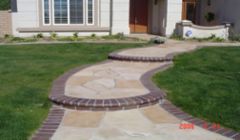 Flagstone walkway with brick boarders