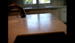 Etched marble counter-top before re-surfacing and re-polishing.