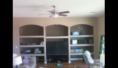 completed entertainment center with lights at arches