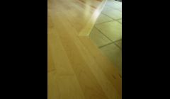 Custom installation of pre-finished hardwood flooring.