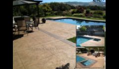 Exterior decorative concrete overlay on a pool deck / patio.