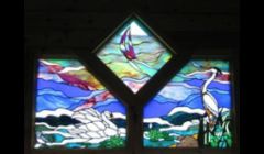 Water scene stained glass window for private residence