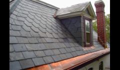 slate roof with inline copper gutters