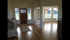 interior shot of dining and front entry, hickory flooring