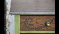 Refinished top and drawers.  Custom Chalk Paint sides.  Drawer fronts with hand painted design.