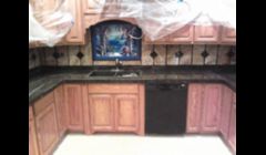 I DID THE COUNTER TOPS AND ALL THE BACK SPLASH