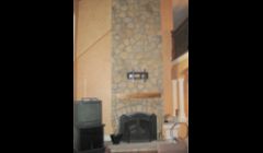 Stone veneer fireplace