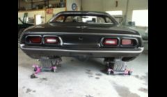 1975 Dodge Challenger with shaved & tucked bumpers.