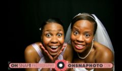 Gia and her bridesmaids hamming it up in the Oh! Snap! Photobooth at Gia & Aaron's wedding reception in Kansas City, MO. By Ailecia Ruscin, 2012.