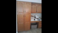 Old golden oak cabinets.