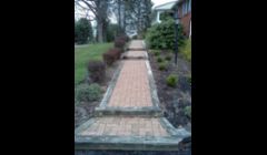Omni stone walk removed and reset with pavers removed.