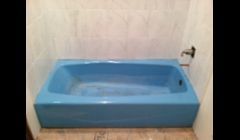 Old 70's blue bathtub