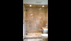 Custom shower... Falmouth, Ma. once a fiberglass shower this bath was completely remodeled with marble tile including a bench in the shower and custom fit glass doors...