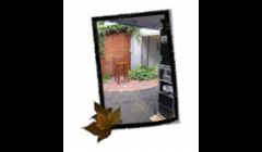 Here is a picture of the photo booth at a retirement party using the Open Air feature to show off her beautiful garden party.