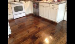 Wide plank New england white pine.  Sanded and stained English Chestnut(minwax)