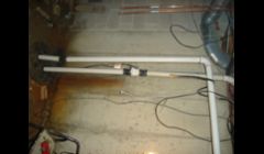 ejector pit. over head drain.