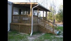 This is a front deck that we did with a tin roof.\n