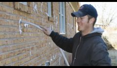 RetroFoam being injected into exterior walls of existing home