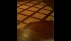 this was a custom floor with hardwood floor border and tile interlay