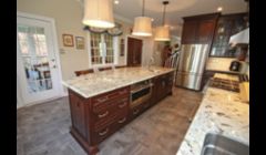 Cherry kitchen with Alaskan White granite countertops.
