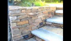 Stone wall w/ granite steps
