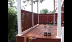 A work in progress... finished last fall. Built w/low maintenance, long-lasting composite material, this became a covered, screened in porch w/a beautifully shingled A-frame roof & ceiling fan. It was a beautiful addition to a row home. 