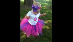 Presley modeling her personalized cupcake onesie and matching tutu.  We also do these in the color scheme of your choice and have several samples shown on our website.  Outfit costs $25.00, plus $4.00 shipping.  Available in sizes 0-3T.